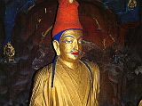 Tibet Lhasa 04 02 Potala Songtsen Gampo Tradition holds that the small, dim chapel of Chogyal Drubphuk was the cave where King Songtsen Gampo meditated. His statue has a high turban with the head of Amitabha emerging from the top. It is likely that the statue was created between 750-850.